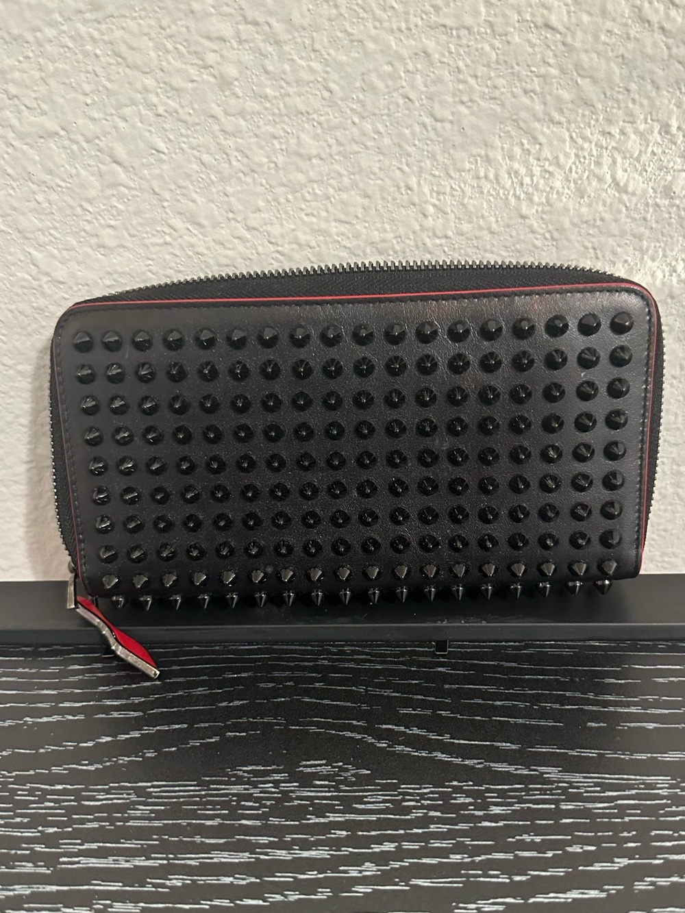 Black Studded Zip-Around Wallet with Red Trim